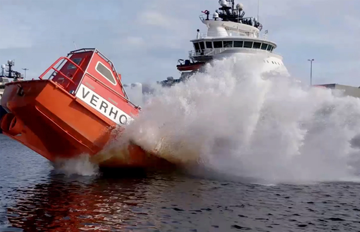 an oil rig escape boat hitting the water