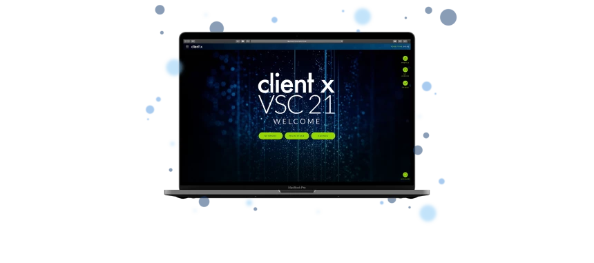 a laptop showing the login screen for a virtual event