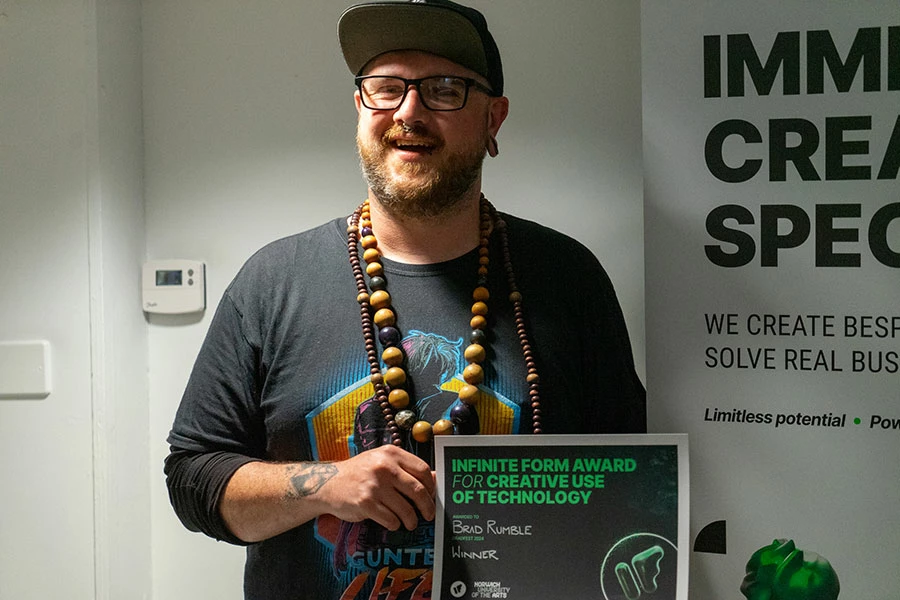 <img="award" alt=" receiving an award certificate for creative technology"